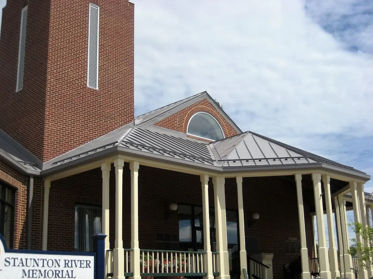 Skilled roofing craftsmen working on a residential roof in Smiths Mills